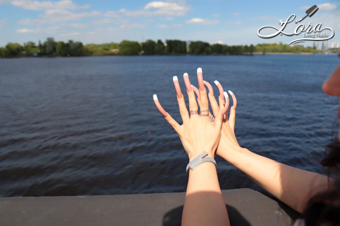 Photo session of long nails on the embankment of the Dnieper river in Kiev