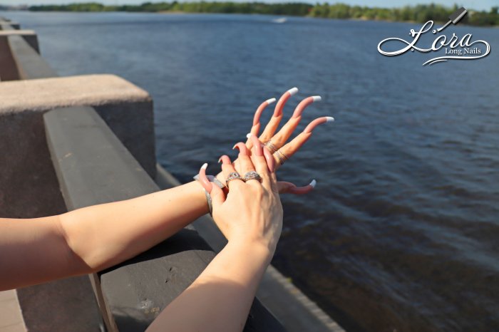 Photo session of long nails on the embankment of the Dnieper river in Kiev