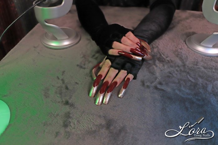 Photoshoot of long red nails for the New Year's video