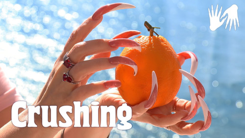 Crushing 🍊 an orange with long claws