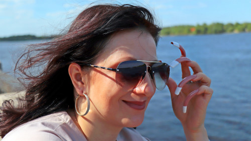 Photo session of long nails on the embankment of the Dnieper river in Kiev