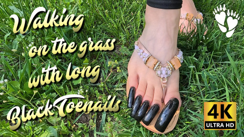Walking on the grass with long black toenails